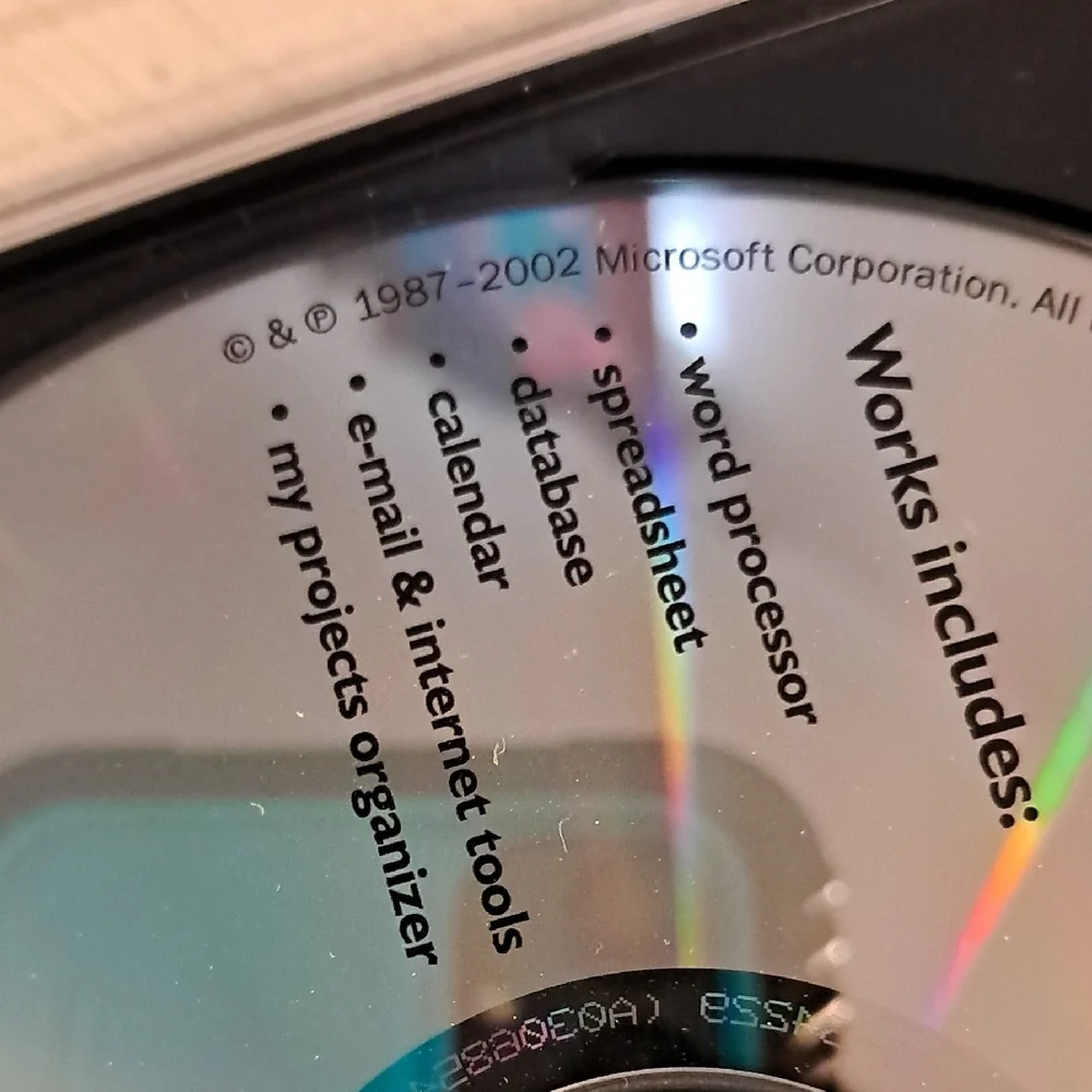 Microsoft Works and Money CD Collection - Silver and Black
